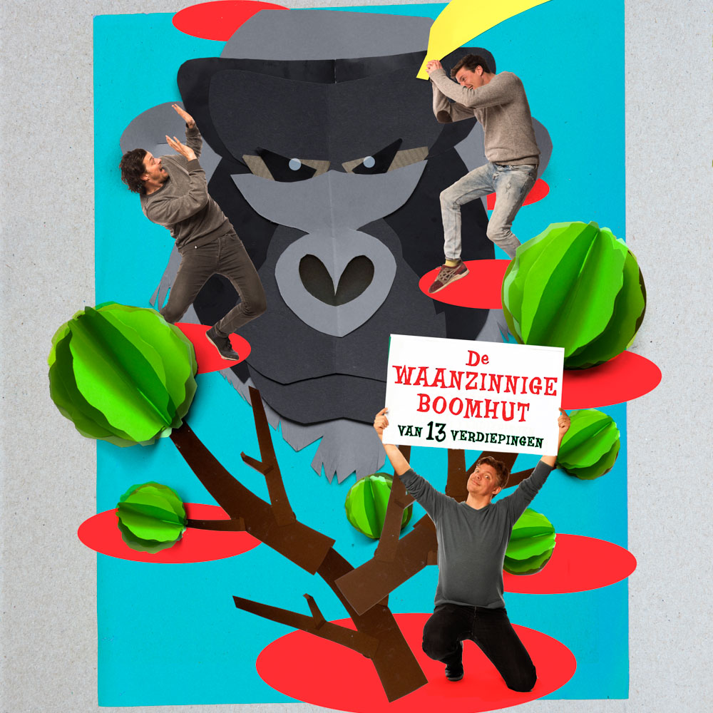 Twee acteurs klimmen in papieren bomen met een grote gorilla op de achtergrond.